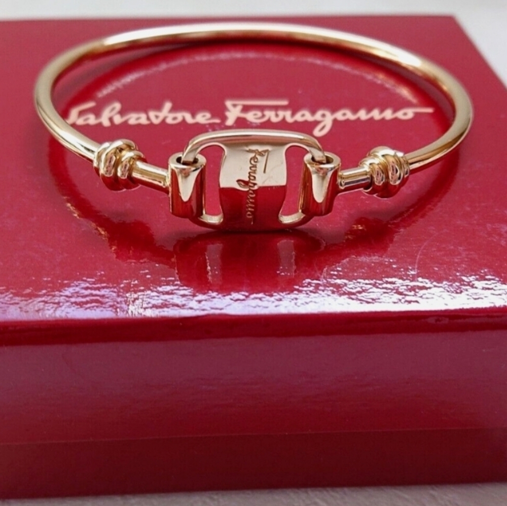 Salvatore Ferragamo Gold Logo Bangle Bracelet.